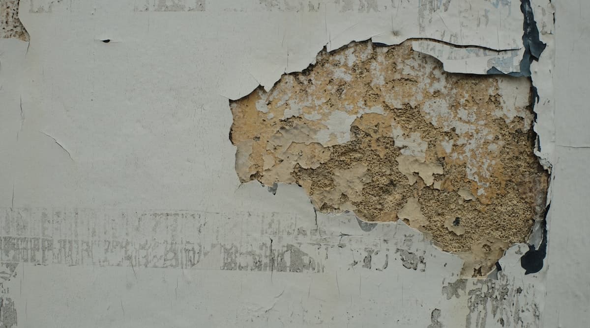 Applying joint compound to a drywall patch with a putty knife